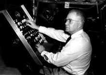 Norman Herrett at the controls of his hand-built planetarium.