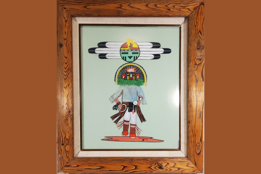 Painting of a kachina doll that uses traditional indigenous colors such as white, red, and green