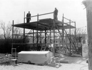 Construction of the Herrett Observatory and Planetarium, circa 1955. The low metal enclosure in the foreground houses the 12½" Newtonian telescope.