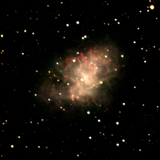 An image of a nebula with a light orange hue