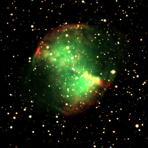 An image of a nebula with a green and red hue